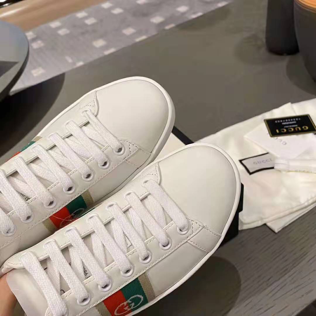 G*u*i gg unisex ace sneaker with interlocking g house web white leather