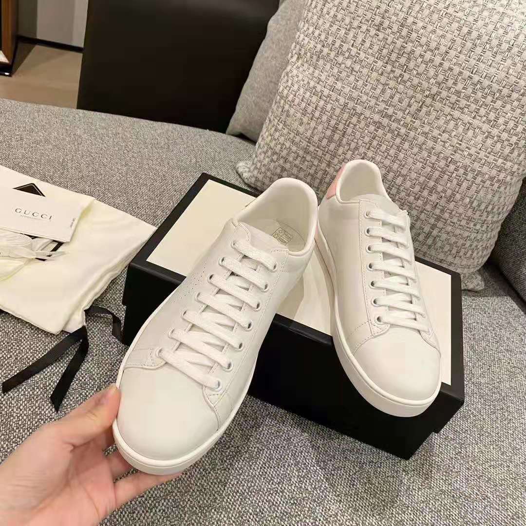 G*u*i gg unisex ace sneaker with interlocking g white scrap less leather