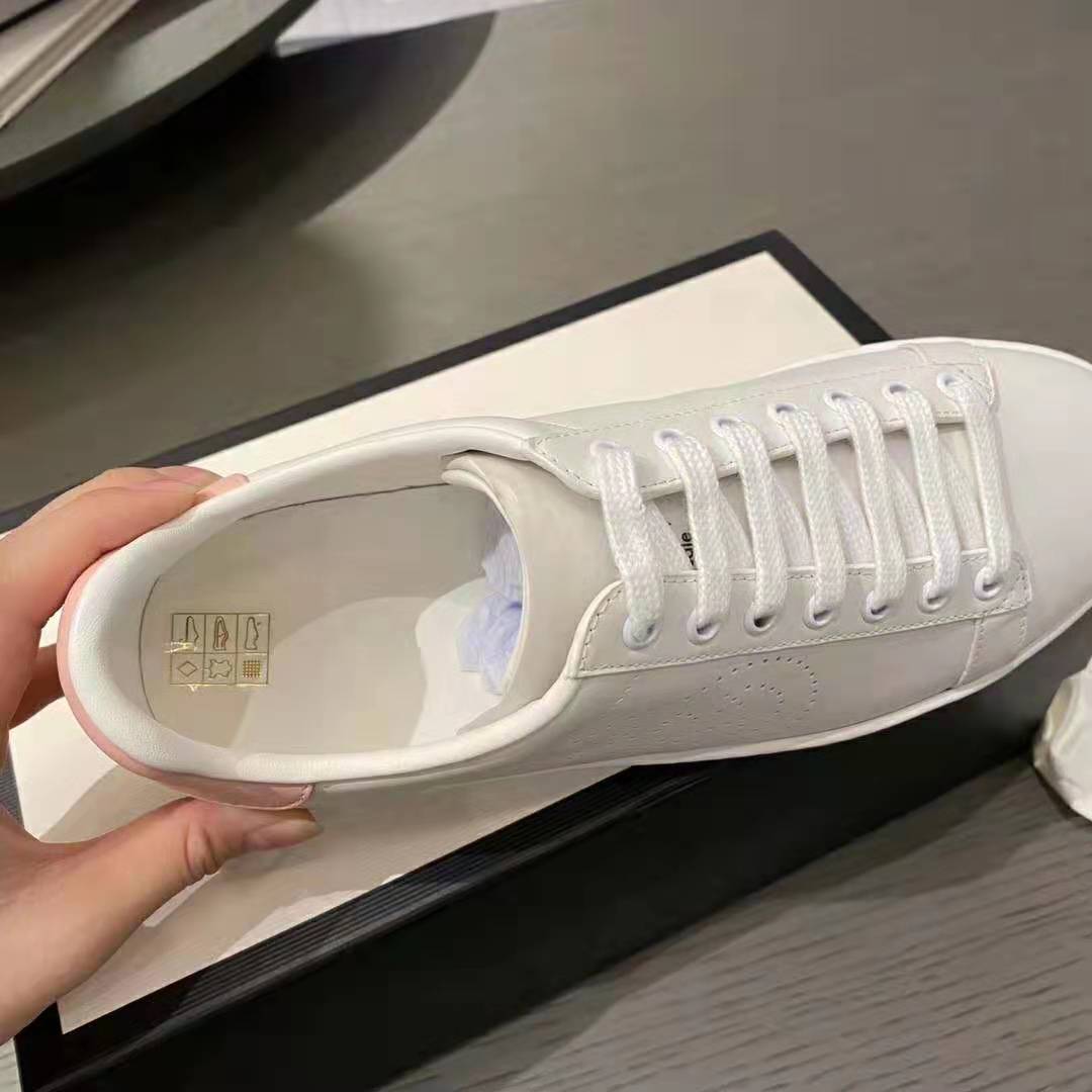 G*u*i gg unisex ace sneaker with interlocking g white scrap less leather