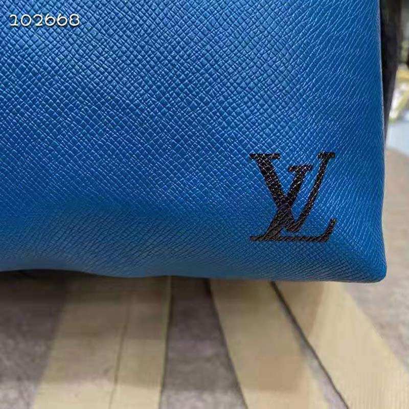 louis vuitton unisex discovery “v” logo backpack blue monoCh*0me taiga leather