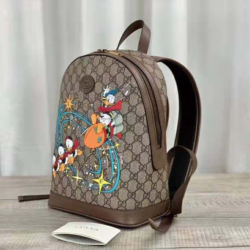G*u*i unisex disney x G*u*i donald duck small backpack leather interlocking g
