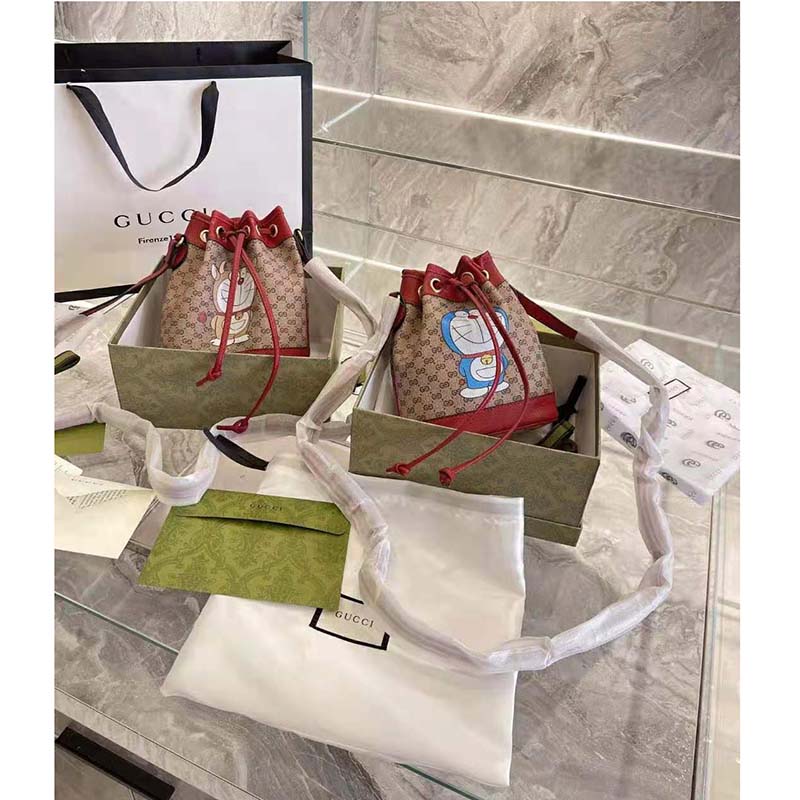G*u*i women doraemon x G*u*i small bucket bag beigeebony mini gg supreme canvas