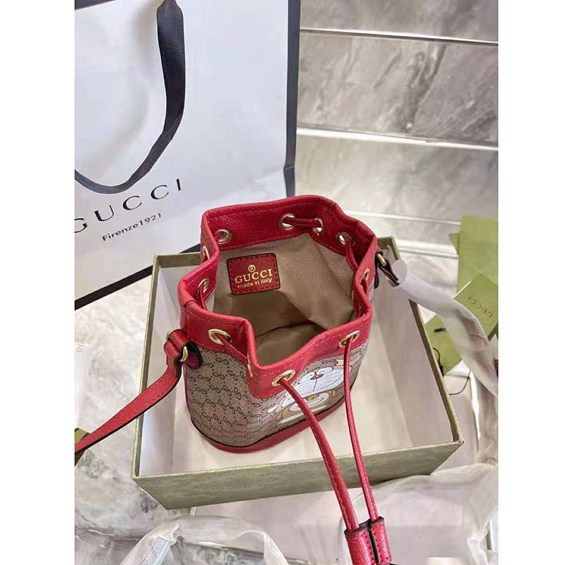 G*u*i women doraemon x G*u*i small bucket bag beigeebony mini gg supreme canvas