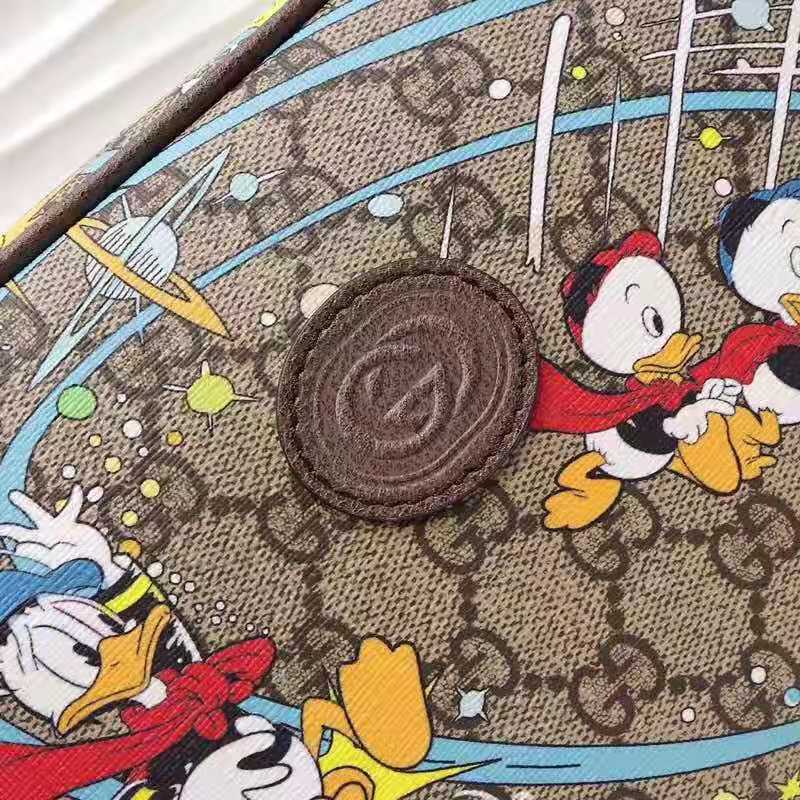 G*u*i unisex disney x G*u*i donald duck print belt bag leather interlocking g