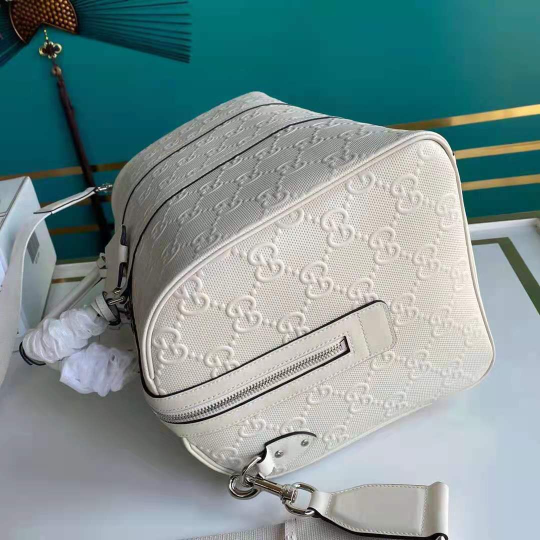 G*u*i gg unisex gg embossed duffle bag white gg embossed leather