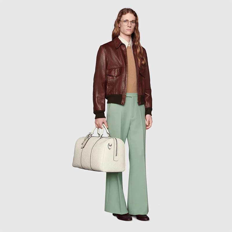 G*u*i gg unisex gg embossed duffle bag white gg embossed leather