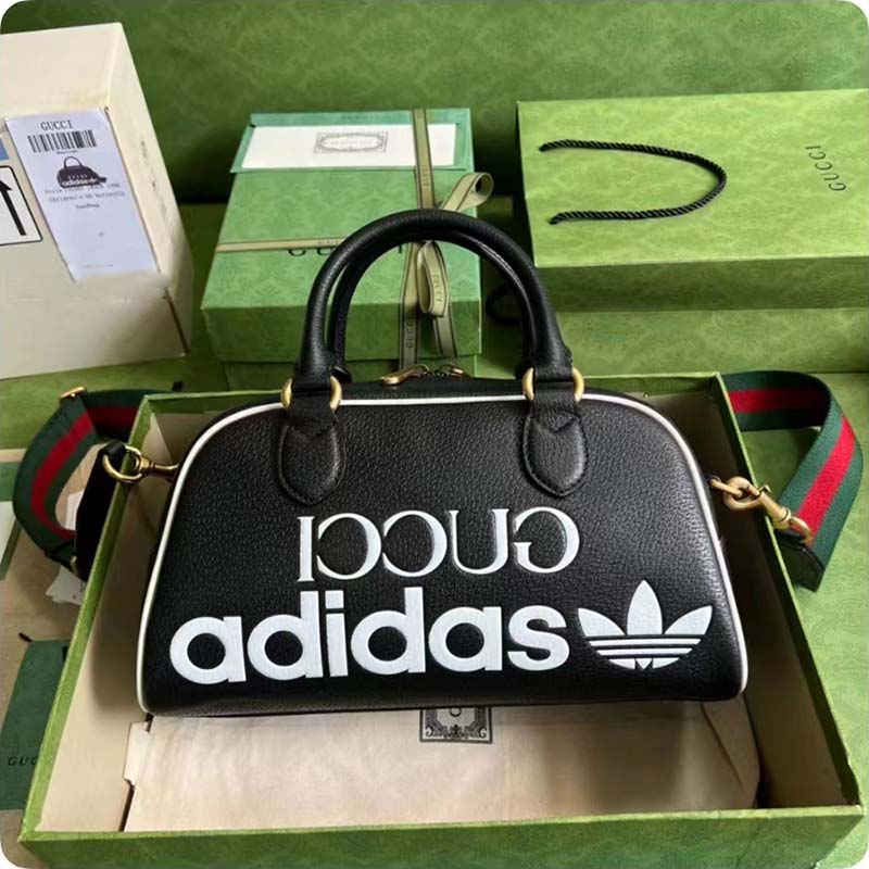 G*u*i unisex adidas x G*u*i mini duffle bag black leather interlocking g