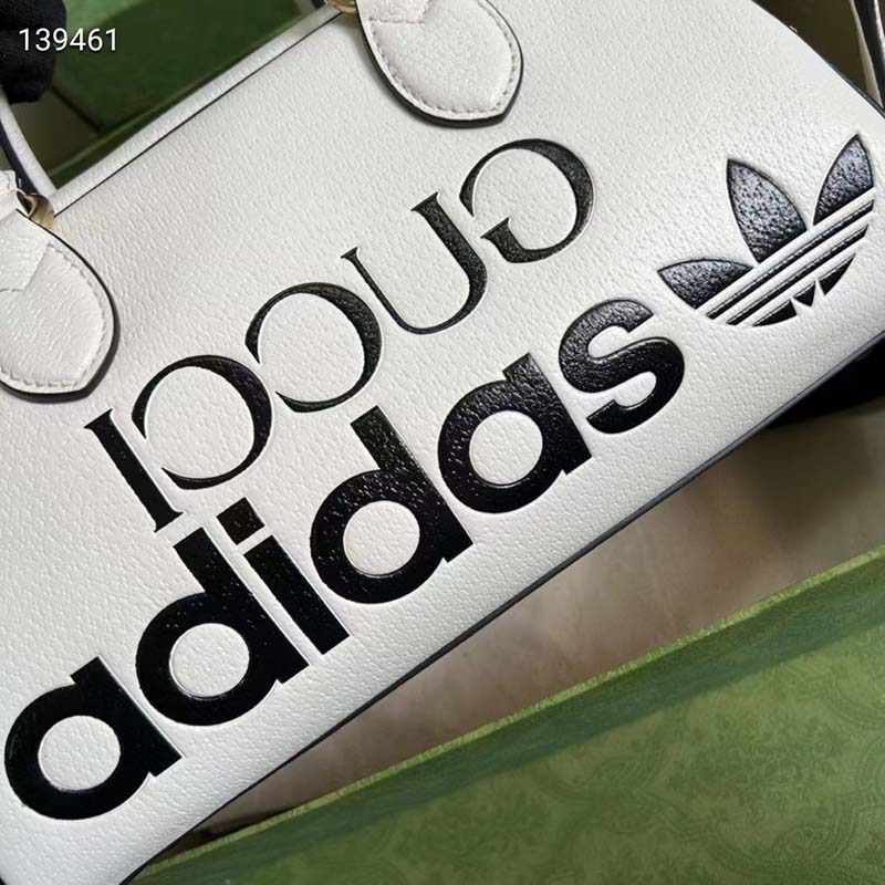 G*u*i unisex adidas x G*u*i mini duffle bag off-white leather interlocking g