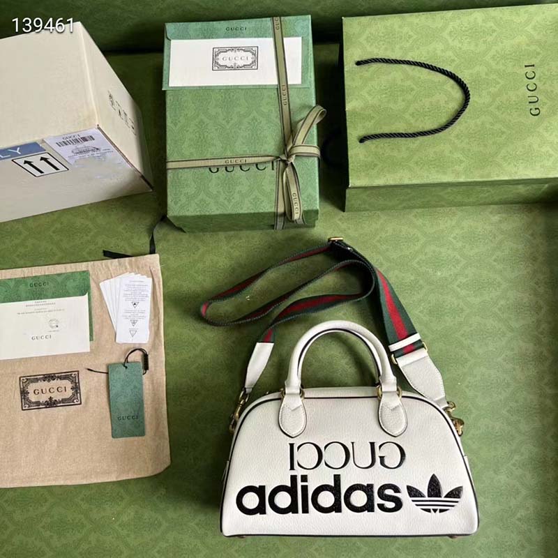 G*u*i unisex adidas x G*u*i mini duffle bag off-white leather interlocking g
