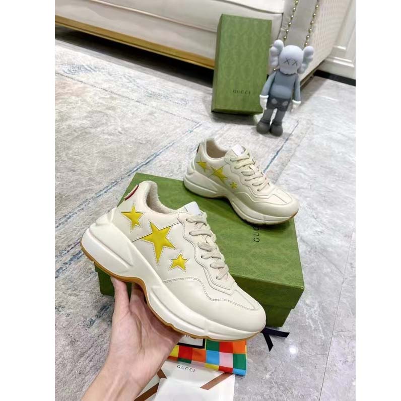G*u*i unisex gg rhyton sneaker white demetra inlaid interlocking g stars rubber low heel