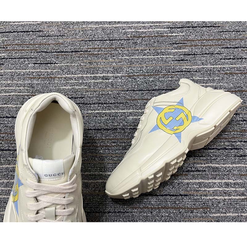 G*u*i unsiex rhyton star print sneaker ivory leather interlocking g rubber sole mid heel