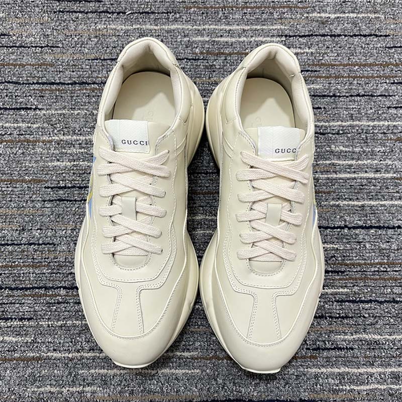 G*u*i unsiex rhyton star print sneaker ivory leather interlocking g rubber sole mid heel