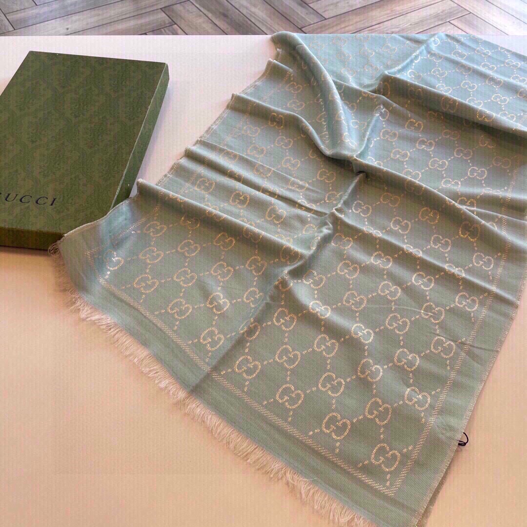 G*u*i unisex gg wool scarf beige mini gg wool turquoise tassel detail