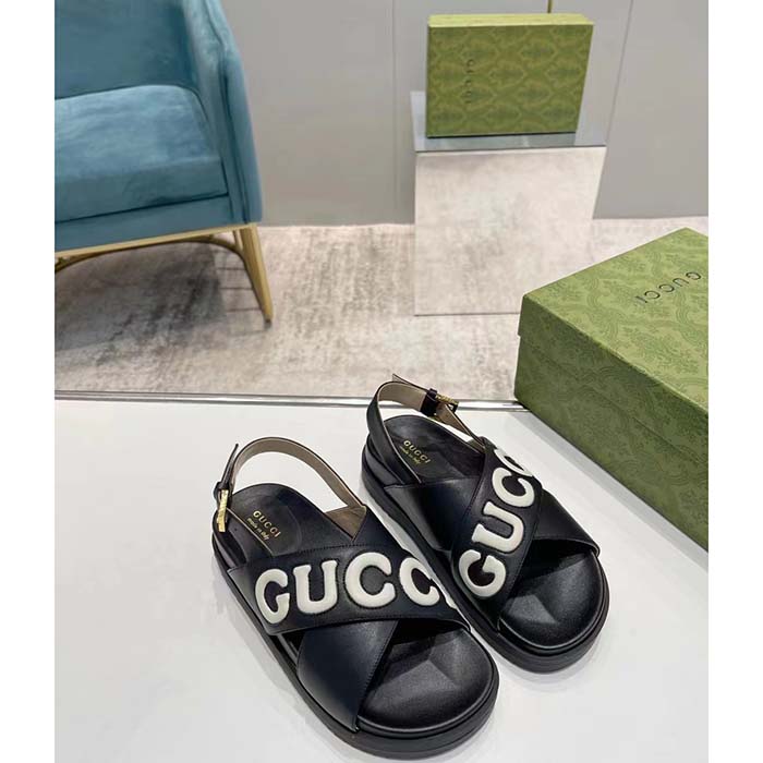 G*u*i unisex gg sandal black white leather script rubber buckle flat
