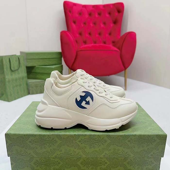 G*u*i unisex interlocking g rhyton sneakers ivory leather navy cut-out rubber sole