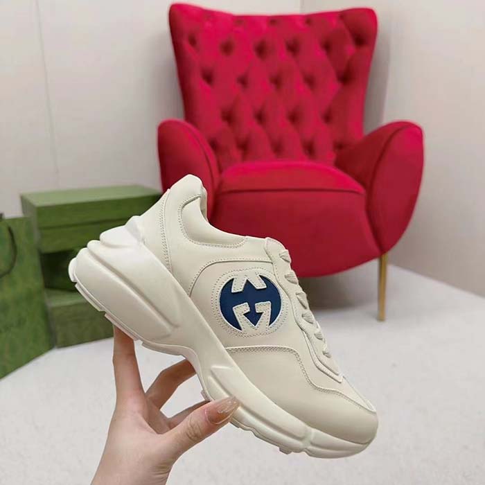 G*u*i unisex interlocking g rhyton sneakers ivory leather navy cut-out rubber sole