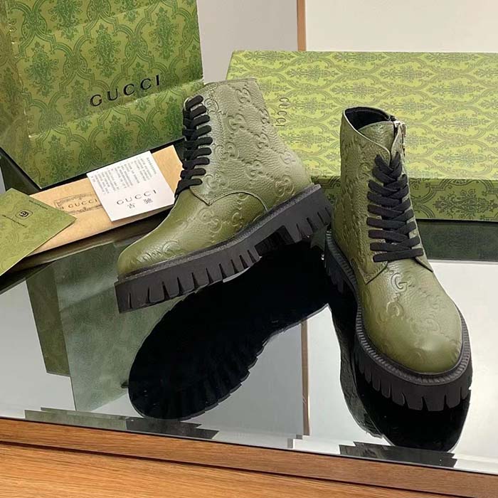 G*u*i unisex gg leather boot dark green rubber lug sole lace-up interlocking g low-heel