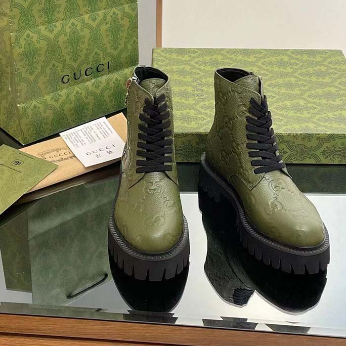 G*u*i unisex gg leather boot dark green rubber lug sole lace-up interlocking g low-heel