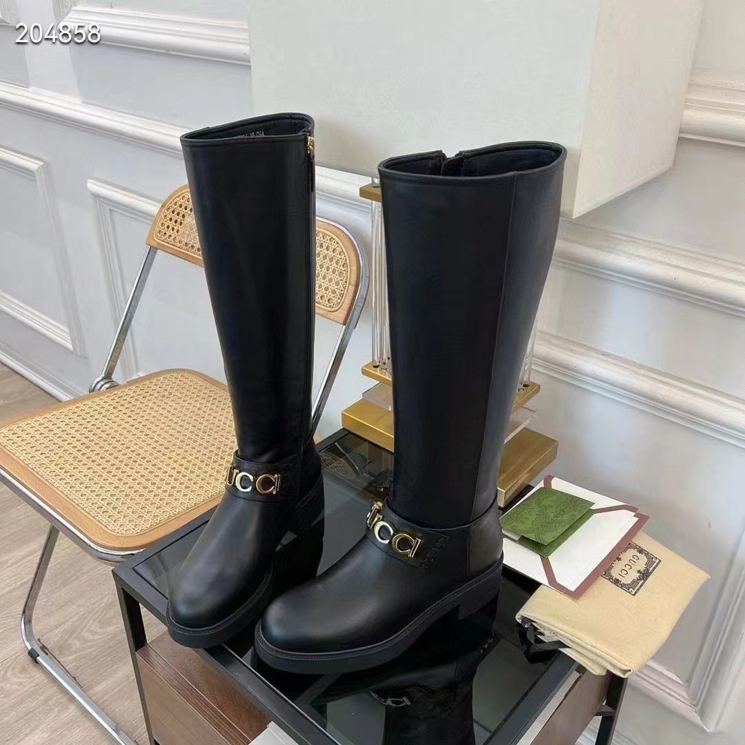 G*u*i women gg G*u*i boot black leather script rubber sole side zip closure flat