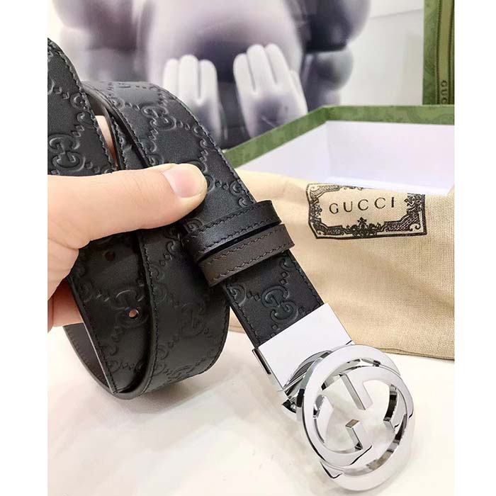 G*u*i unisex gg reversible G*u*i signature belt black leather reverses to brown leather
