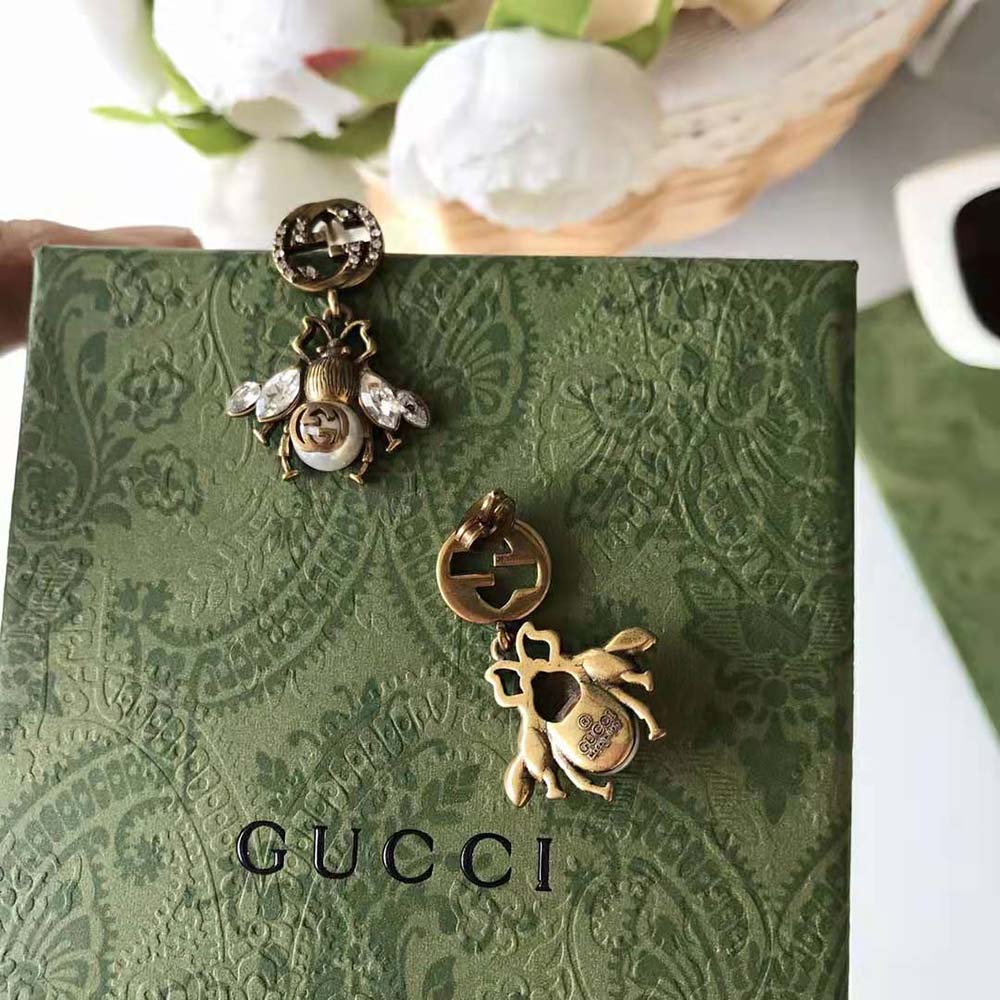 G*u*i women bee earrings with interlocking g