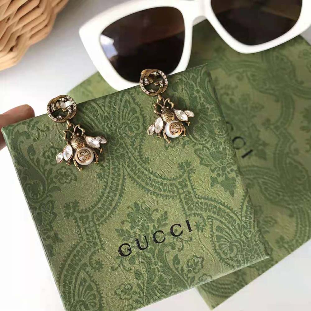 G*u*i women bee earrings with interlocking g