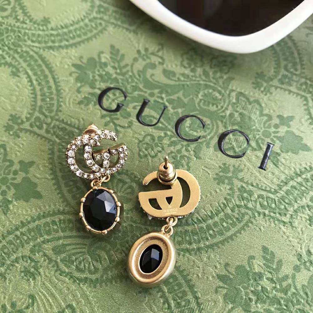 G*u*i women double g earrings with black crystals