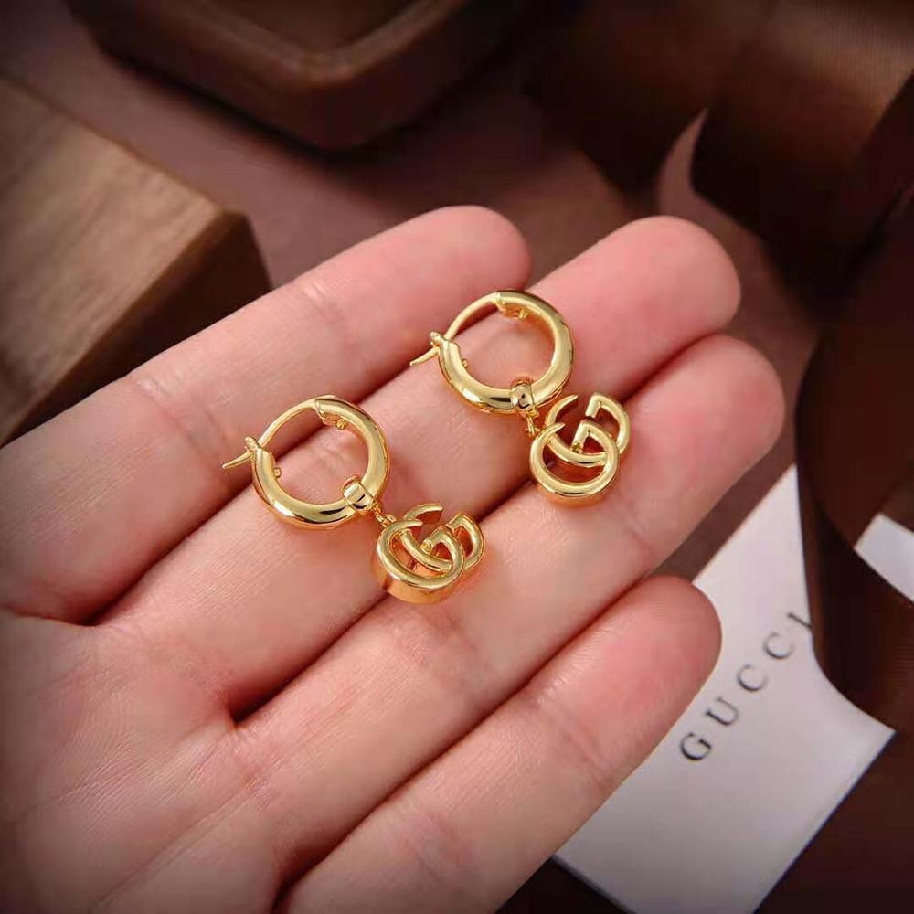 G*u*i women gg running yellow gold earrings