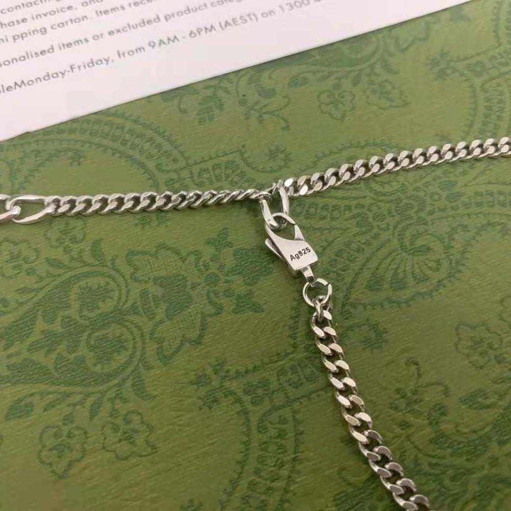 G*u*i women necklace with enamel pendant