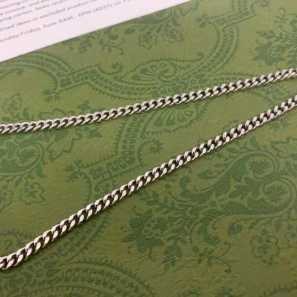 G*u*i women necklace with enamel pendant