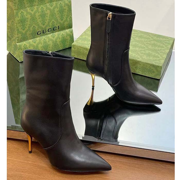 G*u*i women’s ankle boot black leather pointed toe metal effect heel zip closure mid-heel